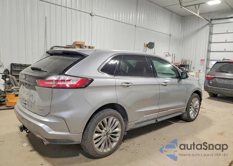 2021 Ford Edge Titanium z USA, uszkodzony, nr VIN 2FMPK4K94MBA50749